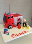 Fire Truck with Fireman figurine 7 inch Cake