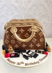 Louis Vitton Bag with make up approx 7 inch Cake